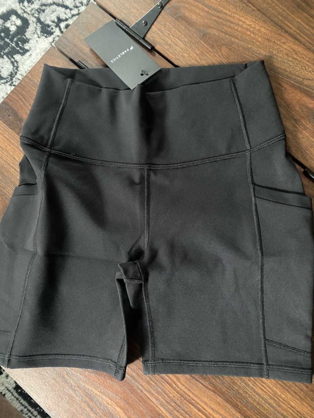 Fabletics Black High-Rise Bike Shorts with Side Pockets